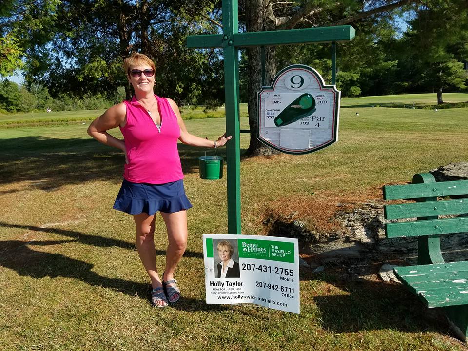 photo of holly taylor in front of golf course ninth hole